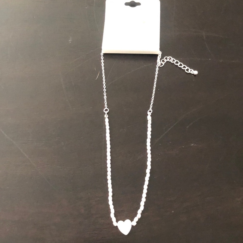 Silver tone heart necklace and earring set
